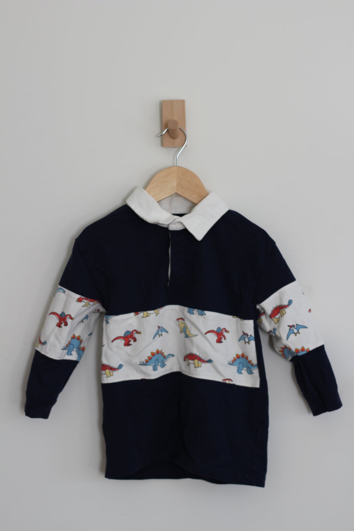 Monica + Andy Organic Cotton Rugby Shirt with Dinosaurs - size 5T